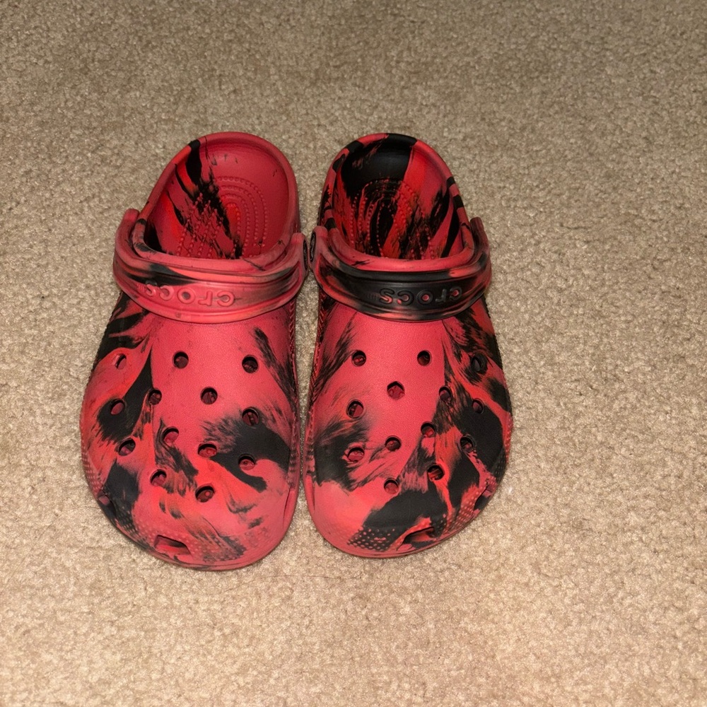 Red and black marble crocs